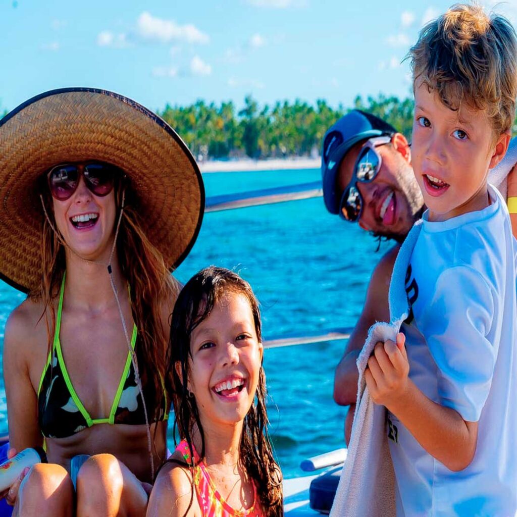 Family enjoying a professional catamaran and snorkeling excursion in Punta Cana