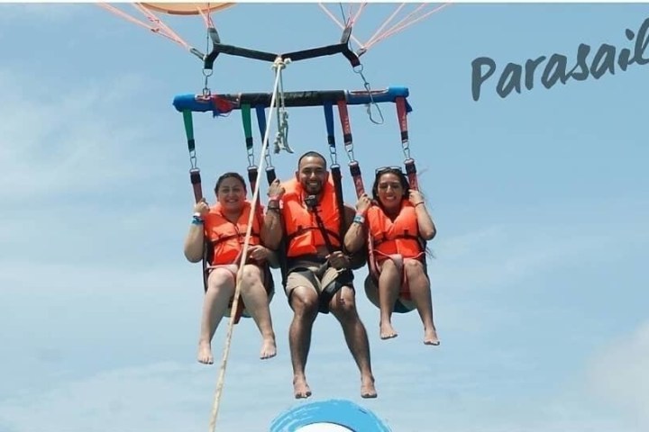 a group of people on a beach